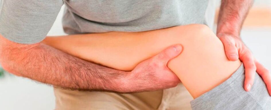 Untersuchung des Kniegelenks auf Schmerzen